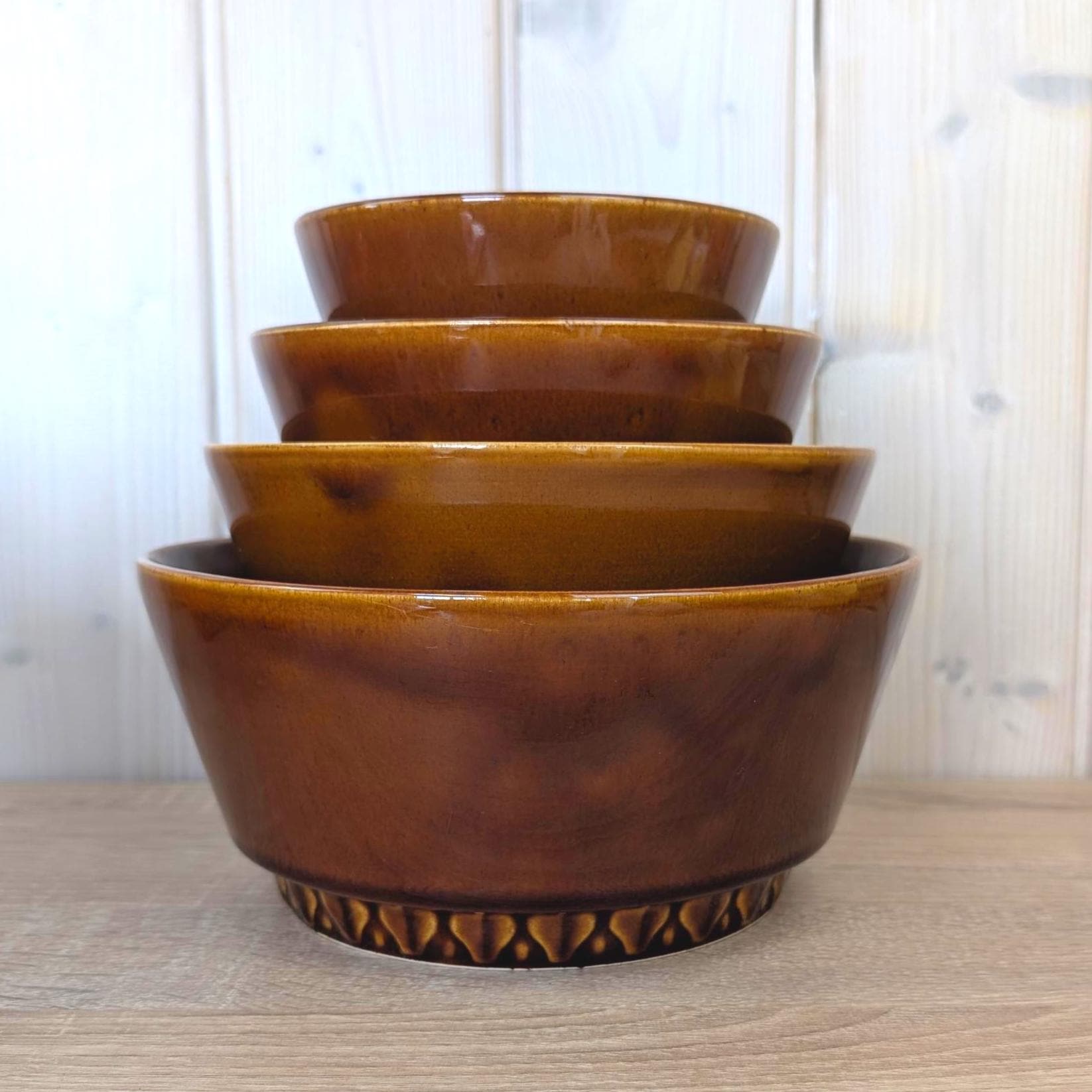DDR GDR Heike Stoneware Nesting Bowl Set of 4, Amber Brown Glaze, Relief Base, East Germany, Torgau, 1970s