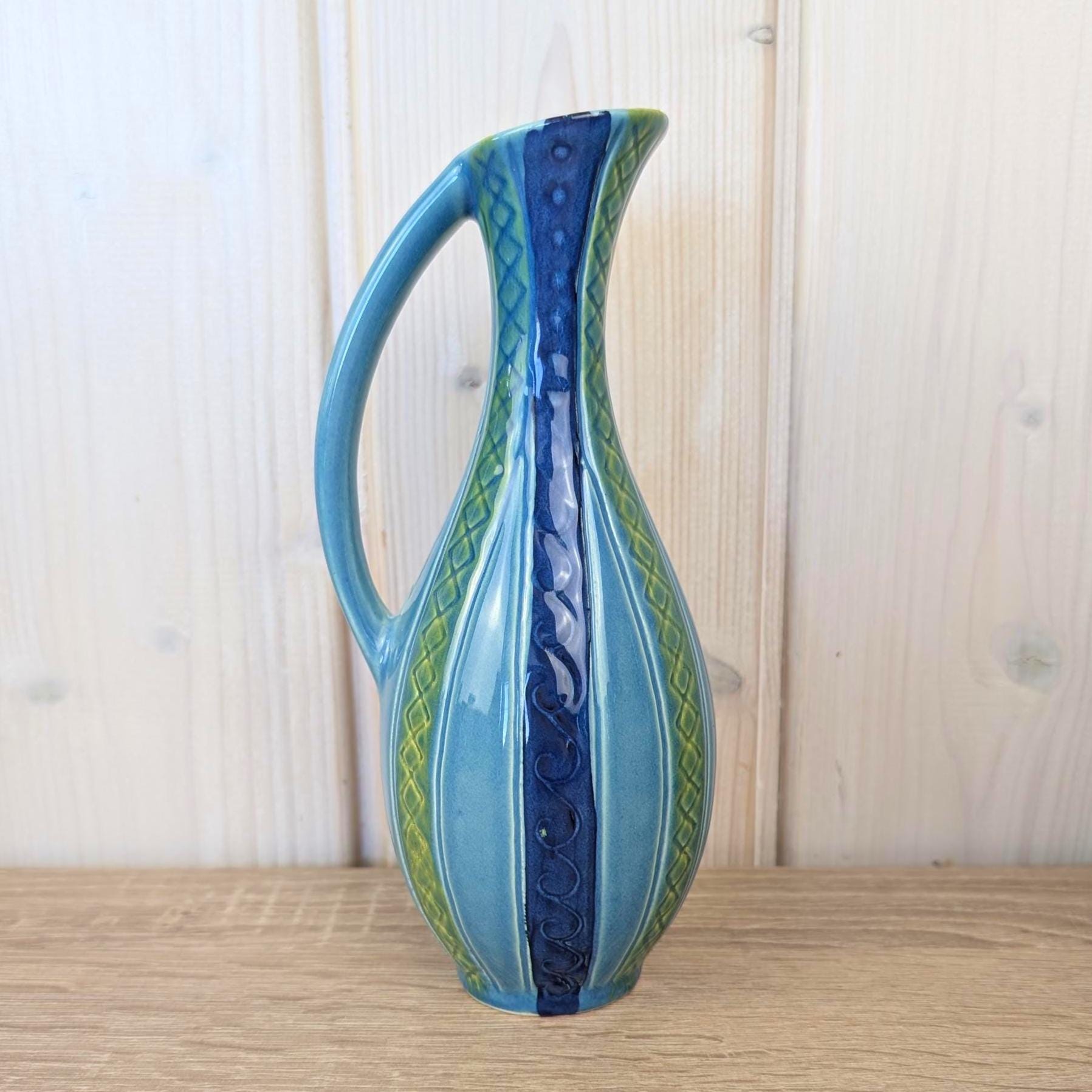 Maltese ceramic pitcher, seahorse relief, blue glaze, 1960s, model 83