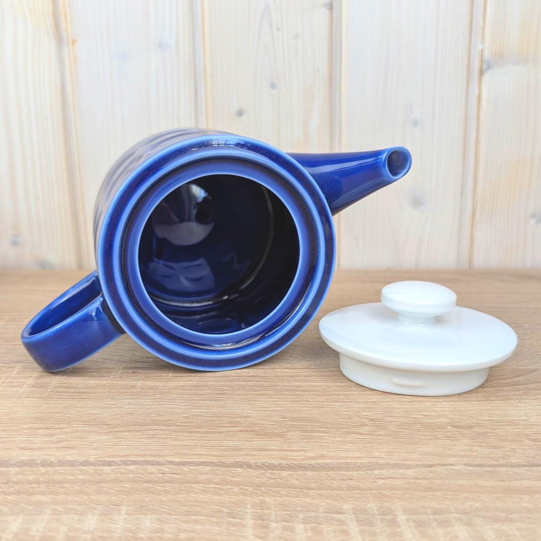 Teapot, Kahla Duett, cobalt blue porcelain, circle relief, white lid, VEB Kahla GDR, 1960s 1970s